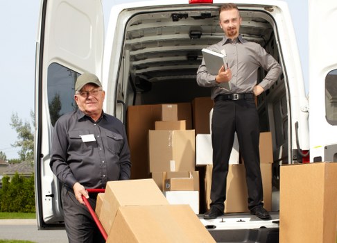 Furniture moving with protective wrapping and careful planning