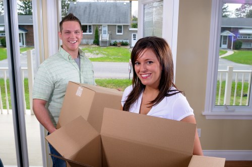 Unpacking service helping settle items into the correct rooms