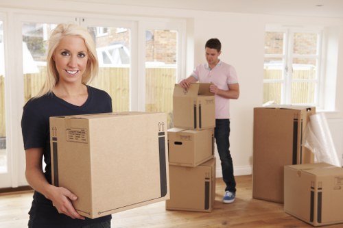 Furniture removal planning with a checklist and moving boxes