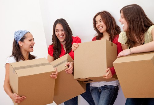 Furniture being secured inside a moving van for transport
