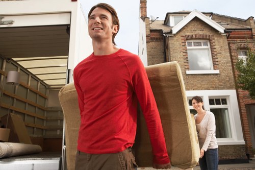 Business move team loading desks and equipment for transport