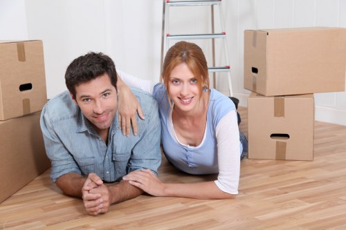Local furniture movers loading bulky household items in Movingfurniture