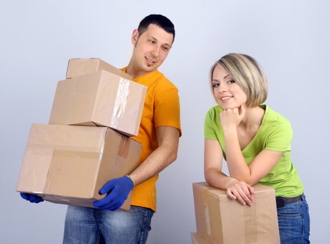 Local home moving team handling furniture for a residential move in Movingfurniture