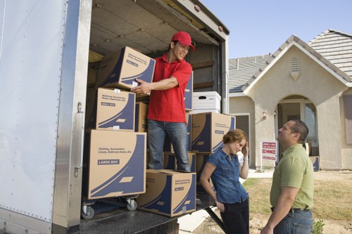 Careful household removals with boxes and furniture in Movingfurniture