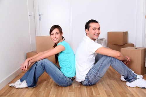Loading bulky household items into a moving van