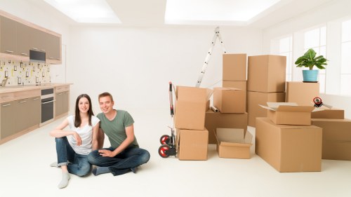 Furniture move preparation with boxes and wrapped items ready