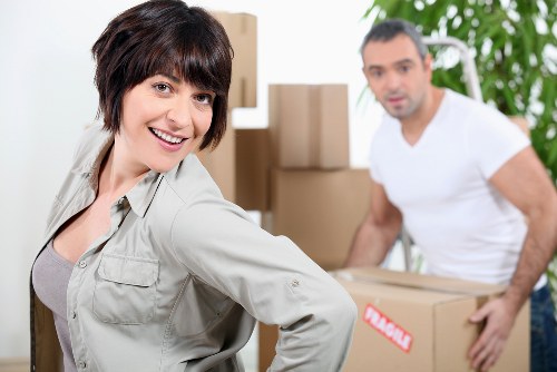 Planned office move with labeled boxes and workstations in Movingfurniture