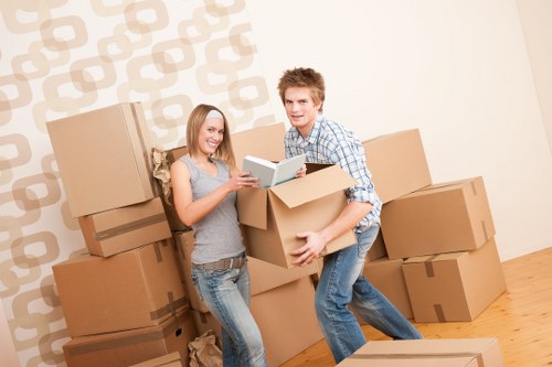 Using tools to move heavy furniture through a home